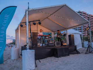 BH 4th of July 2023 307 Band performing on stage at the beach