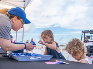 BH 4th of July 2023 44 Children are participating in arts and crafts.
