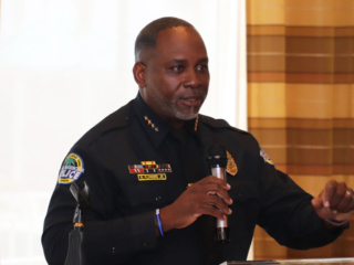 BHV 6-15-23 20 Chief officer speaking at a ceremony.