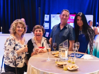 BAL_HARBOR_POLICE-111 People taking a picture at the gala.