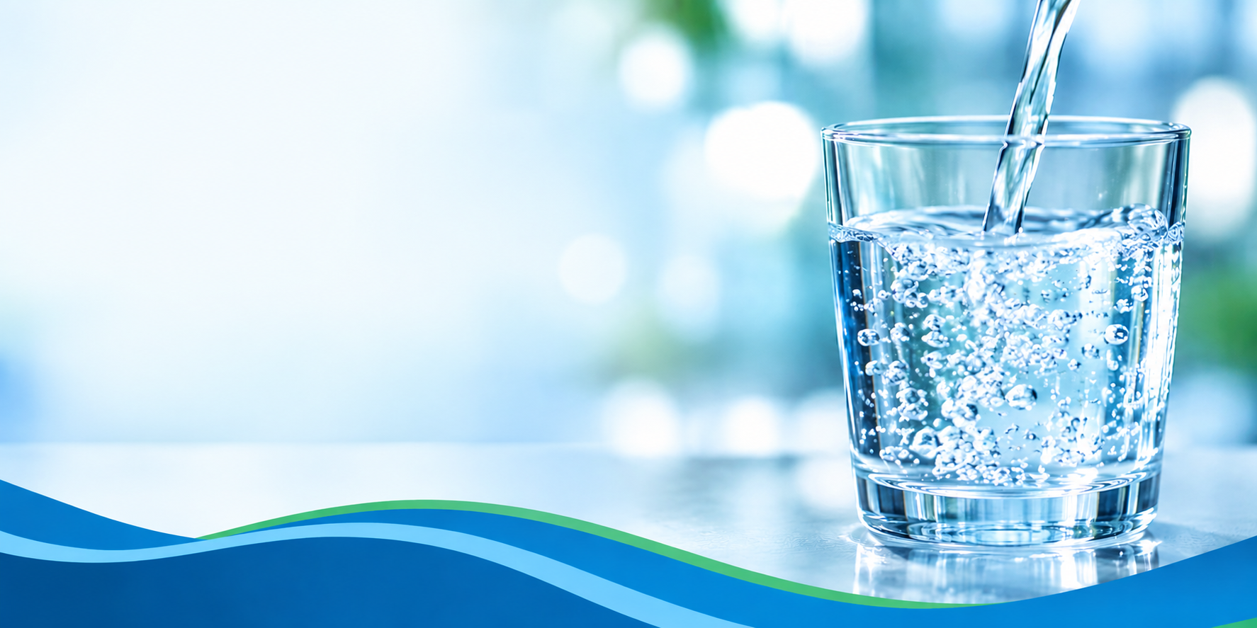 Clear water pours into a glass against a soft blue background, with layered blue and green waves along the bottom.